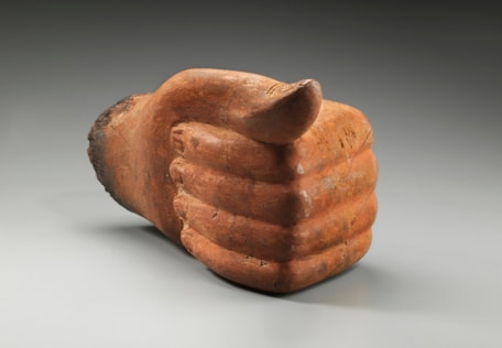Left hand of a large wooden statute